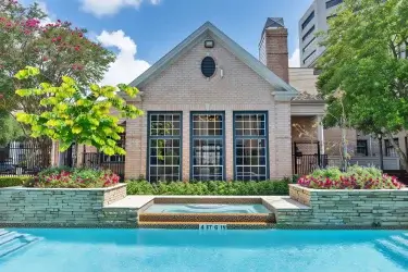 Poolside spa and landscaped courtyard at Gael & Essex House